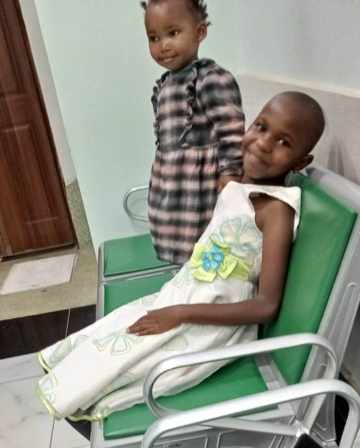 Child receiving dental examination at Lillian Foundation dental program