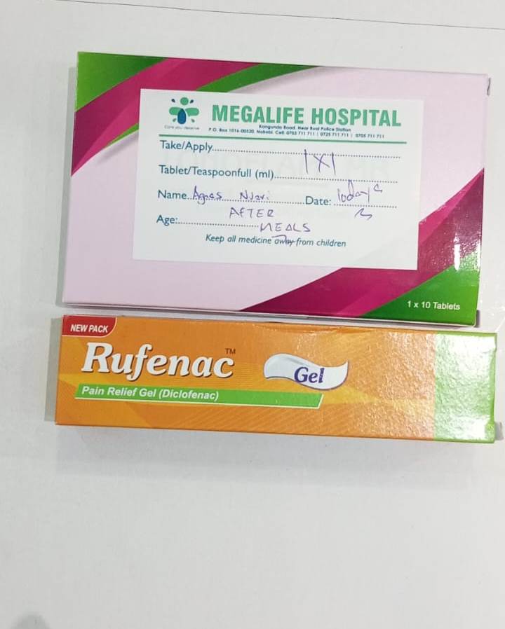 Healthcare worker measuring child's height for growth monitoring